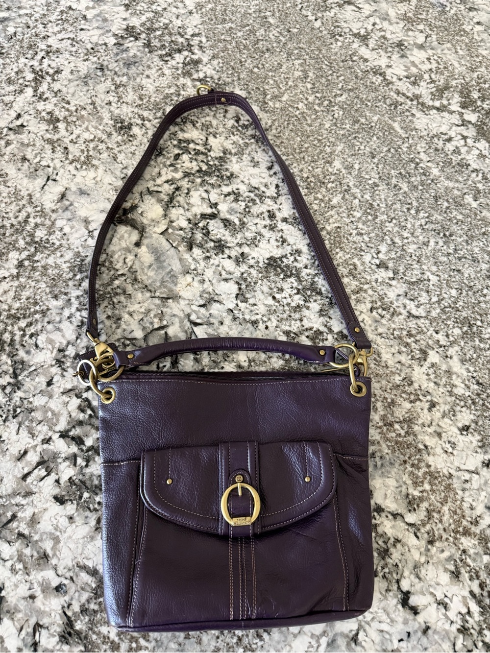 Purple Stone Mountain leather bag with antique brass hardware.
